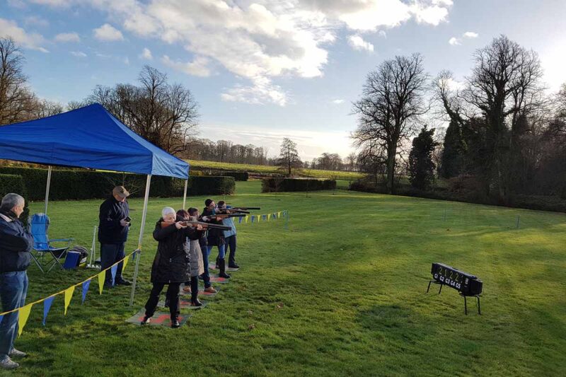 People doing clay pigeon shooting teambuilding on the Knowsley estate