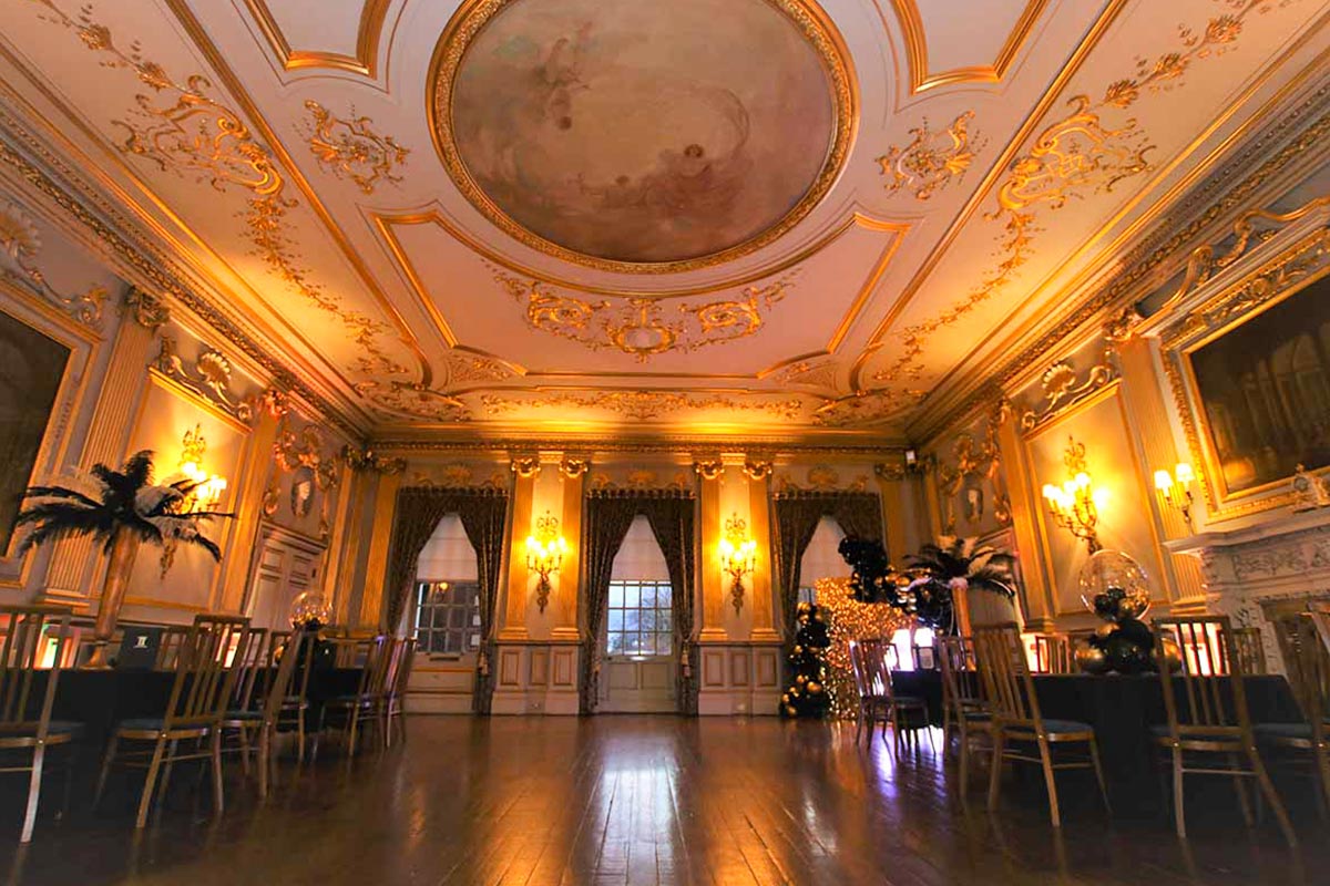 A stunning gold decor room set for a glamourous birthday party at Knowsley Hall